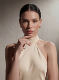 Close-up detail of the Beige silk halter gown