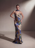 Woman wearing a Blue Floral silk slip gown, front view