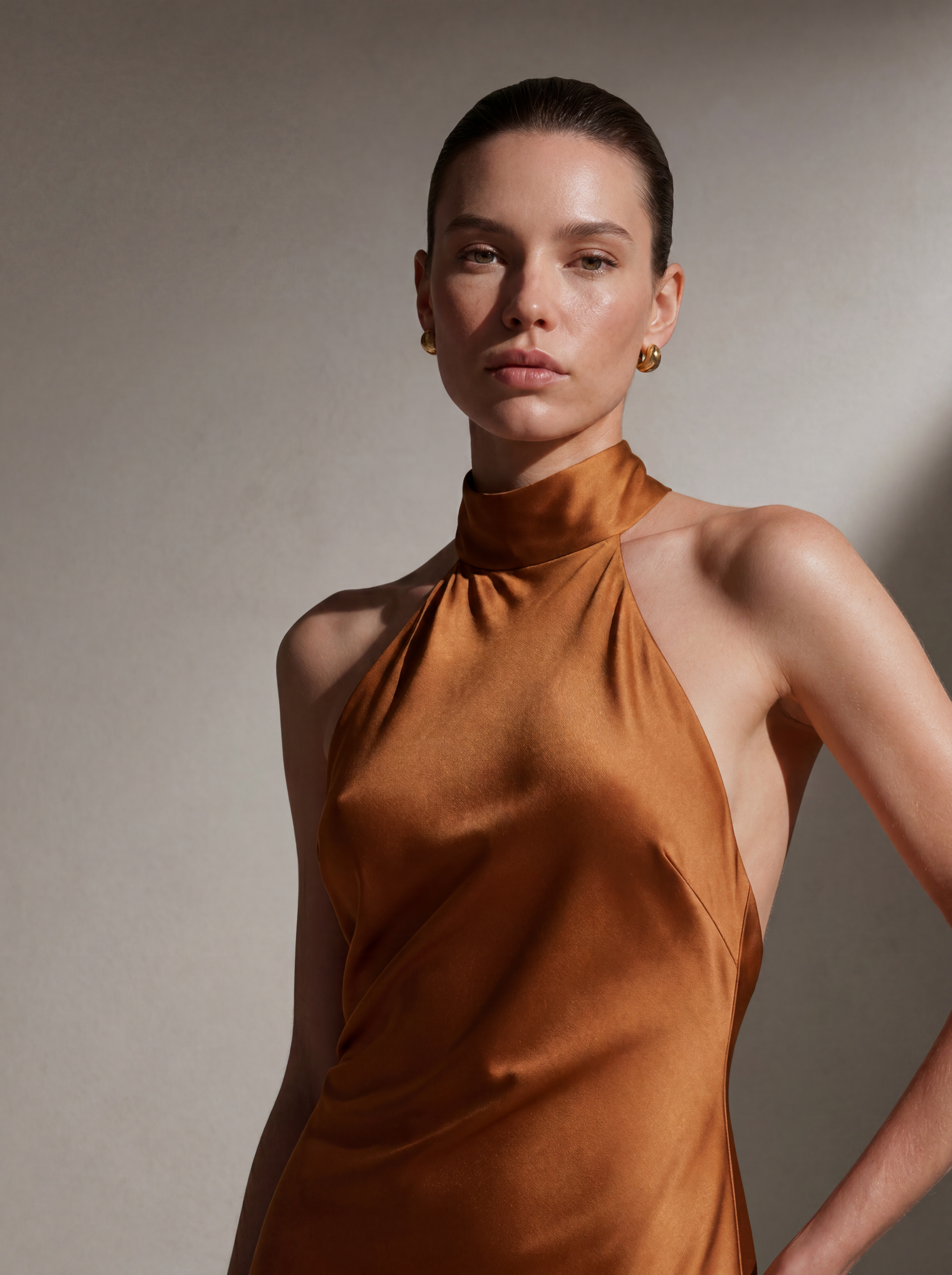 Close-up detail of the Copper silk halter gown