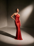 Woman wearing a Cayenne silk halter gown